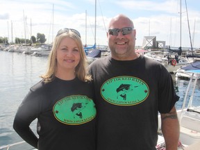 Saskia and Mike Deslauriers, at the Portsmouth Olympic Harbour in Kingston, are organizing this year's Kingston Kids Perch Derby, which will be held on Saturday, August 27. More than 700 kids usually try their luck to catch a fish and win prizes. (Michael Lea/The Whig-Standard)