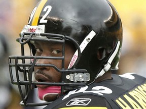 James Harrison of the Pittsburgh Steelers wears a pink chin strap for breast cancer awareness prior to playing the Baltimore Ravens on Oct. 3, 2010. (Gregory Shamus/Postmedia)