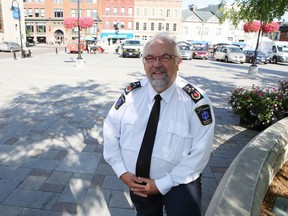 Frontenac Paramedic Services chief Paul Charbonneau stands in Market Square in Kingston. (Elliot Ferguson/The Whig-Standard)
