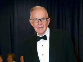 In this April 28, 2012 file photo, John McLaughlin arrives at the White House Correspondents' Association Dinner in Washington. (AP Photo/Kevin Wolf, File)