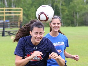 Catherine Rocca, left, and Victoria Galluzzo take part in a drill during a practice for the Laurentian Voyageurs at Laurentian University in Sudbury, Ont. on Tuesday August 16, 2016. John Lappa/Sudbury Star/Postmedia Network
