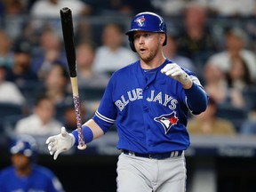 Toronto Blue Jays Justin Smoak reacts after striking out swinging in the eighth inning of his team's game against the New York Yankees in New York, Aug. 15, 2016. That night, the Yankees shut out the Blue Jays 1-0. (KATHY WILLENS/AP)