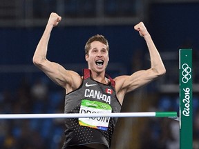 Canada's Derek Drouin competes in the men's high jump during the 2016 Olympic Summer Games in Rio de Janeiro, Brazil on Tuesday, Aug. 16, 2016. (THE CANADIAN PRESS/Sean Kilpatrick)