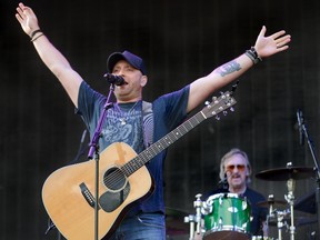 Tim Hicks, the St. Catharines-based performer who has shared the stage with Blue Rodeo and Ron Sexsmith, will perform at an outdoor show beside Budweiser Gardens to launch Country Music Week on Sept. 8. (MORRIS LAMONT, The London Free Press)