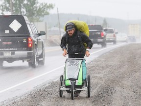 Dylan Gray, 27, of Calgary, passed through Sudbury, Ont. on Tuesday August 16, 2016 as part of his run across Canada. Gray is raising money and awareness for the organization called Against Malaria Foundation. He left Halifax on June 24 and he hopes to reach the Pacific coast by November. To make a donation go to againstmalaria.com/stepstoendmalaria. John Lappa/Sudbury Star/Postmedia Network