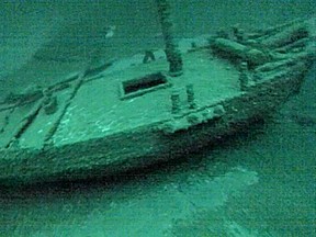 This July 16, 2016, photo taken from underwater video shows the "Washington", which sank during a storm in 1803. The team of underwater explorers says it has found the second-oldest confirmed shipwreck in the Great Lakes, an American-built, Canadian owned-sloop that sank in Lake Ontario 213 years ago. (Roger L. Pawlowski via AP)