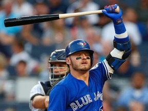 Josh Donaldson of the Toronto Blue Jays reacts after striking out in the first inning of a game against the New York Yankees at Yankee Stadium on August 15, 2016. (Photo by Rich Schultz/Getty Images)