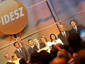Hungarian Prime Minister Viktor Orban, centre, delivers his victory speech at the election party of the governing FIDESZ party in Budapest on May 25, 2015, during the night of European Parliamental elections. (FERENC ISZA/AFP/Getty Images)