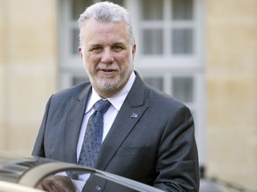 Quebec's Premier Philippe Couillard leaves after a meeting at the Hotel Matignon in Paris, on March 06, 2015. (KENZO TRIBOUILLARD/AFP/Getty Images)