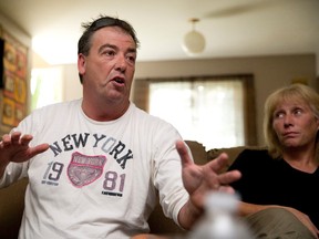 Strathroy cab driver Terry Duffield, seen with girlfriend Marianne Dieckmann in his home Wednesday, August 17, 2016, describes the moment when terrorism suspect Aaron Driver detonated an explosive device in the back seat of his taxi. (Craig Glover/Postmedia Network)