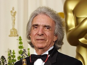 This file photo taken on March 24, 2002 shows Canadian-born director Arthur Hiller holding his Oscar backstage at the 74th Annual Academy Awards at Kodak Theater in Hollywood, California. Hiller died on August 17, 2016 in Los Angeles of natural causes./ AFP PHOTO / LEE CELANOLEE CELANO/AFP/Getty Images