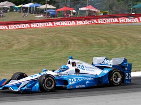 Simon Pagenaud, of France, heads through a turn during the IndyCar Honda Indy 200 auto race Sunday, July 31, 2016, at Mid-Ohio Sports Car Course in Lexington, Ohio. Pagenaud won the race. (AP Photo/Tom E. Puskar)