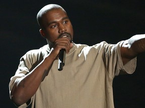 Kanye West accepts the video vanguard award at the MTV Video Music Awards at the Microsoft Theater in Los Angeles. West announced on Twitter Aug. 17, 2016, that he will open 21 temporary "Pablo" stores worldwide on the weekend of Aug. 20. (Photo by Matt Sayles/Invision/AP, File)