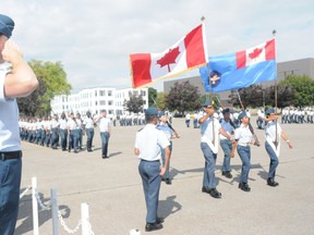 Ernst Kuglin/The Intelligencer
Reviewing Officer Brig. Gen. Frances Allen salutes during a march past by 400 cadets at the final graduation parade held Thursday at the Trenton Cadet Training Centre, CFB Trenton.