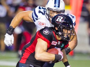 Toronto Argos linebacker Cory Greenwood, a Kingston native, hurt his knee last week and could miss up to five weeks of action. (Postmedia Network)