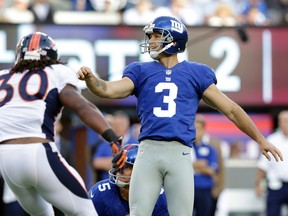 In this Sept. 15, 2013, file photo, New York Giants kicker Josh Brown (3) reacts after kicking a field goal against the Denver Broncos in East Rutherford, N.J. (AP Photo/Kathy Willens, File)