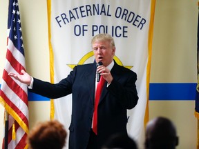 Republican presidential candidate Donald Trump speaks to retired and active law enforcement personnel at a Fraternal Order of Police lodge during a campaign stop in Statesville, N.C., Thursday, Aug. 18, 2016. (AP Photo/Gerald Herbert)