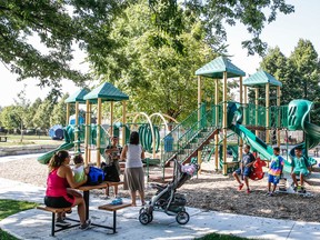 Children play in Wadsworth Park, in the St. Clair Ave. W. and Old Weston Rd. area of Toronto, Thursday August 18, 2016 hours after peanut butter was reportedly found smeared over the playground, potentially endangering the lives of any child with a peanut allergy. (Dave Thomas/Toronto Sun)