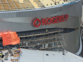 EDMONTON ALBERTA: August 3, 2016 Crews work on installing the Rogers Place sign in Edmonton August 3, 2016. AMBER BRACKEN / Postmedia