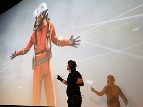 Kyle McCall, of NORCAT, demonstrates NORCAT's avatar-based simulation at the premiere of FERDENO, an interactive and digital underground mine at Dynamic Earth in Sudbury, Ont. on Thursday August 18, 2016. John Lappa/Sudbury Star/Postmedia Network