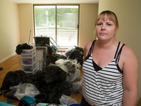 Shannon Scott has many of her belongings in garbage bags after discovering a bed bug infestation in her Adelaide Street North apartment building. Scott has been staying with a friend until the problem is solved. (MIKE HENSEN/The London Free Press/Postmedia Network)