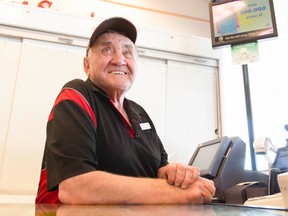 Dick Assman smiles at a South Albert St. Petro-Canada gas station in Regina, Saskatchewan on Tuesday, May 19, 2015. THE CANADIAN PRESS/Michael Bell
