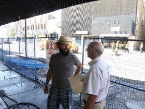 Jason Miller/The Intelligencer
Richard Courneyea discuss the state of the downtown with Bill Saunders, CEO of Belleville and District Chamber of Commerce. Downtown merchants say they’re experiencing challenges because of the construction and are looking forward to completion.