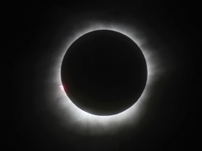 This March 9, 2016 file photo shows a total solar eclipse in Belitung, Indonesia. Hotel rooms already are going fast in Wyoming and other states along the path of next year’s solar eclipse. The total solar eclipse on Aug. 21, 2017, will be the first in the mainland U.S. in almost four decades.  (AP Photo, File)