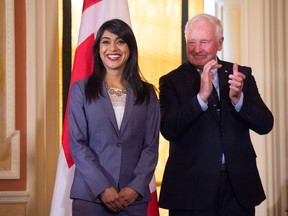 Governor General David Johnston applauds after Minister of Small Business and Tourism Bardish Chagger was sworn in as Leader of the Government in the House of Commons at Rideau Hall on Friday, Aug. 19, 2016 in Ottawa. THE CANADIAN PRESS/Justin Tang