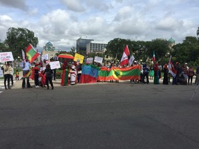About 100 members of Winnipeg's Ethiopian community rally at the Legislature Friday to protest the ruling government in their home country's treatment of the Oromo people.