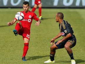 Toronto FC forward Sebastian Giovinco controls the ball against Philadelphia Union defender Fabinho at BMO Field. (John E. Sokolowski/USA TODAY Sports)