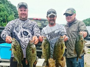Frank Clark, centre, show off the catch from the Nickel City Bass McGregor Bay event with partner DJ Davidson. Photo supplied