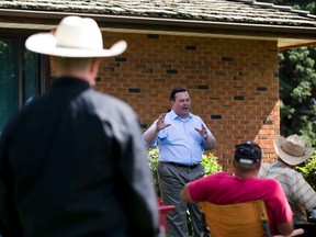 Jason Kenney speaks at a barbecue at the home of Rita Reich on Tuesday, August 16, 2016 near Lacombe. Kenney is travelling around the province as he attempts to ‘unite Alberta’. Greg Southam / Postmedia