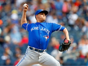 Roberto Osuna of the Toronto Blue Jays pitches in the ninth inning against the New York Yankees at Yankee Stadium on August 17, 2016.  (Jim McIsaac/Getty Images)