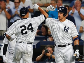 Yankees youngsters Gary Sanchez (left) and Aaron Judge have just begun what should be long and productive MLB careers. (Rich Schultz, Getty Images)