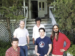 The Kingston Band the Tragically Hip poses for pictures at their private recording studio "The Bathhouse" in a converted 19 century home west of Kingston near the town of Bath.