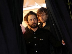 Members of the Sam Roberts Band wait to pose on the red carpet during the 2015 Juno Awards in Hamilton, Ont., on Sunday, March 15, 2015. THE CANADIAN PRESS/Peter Power