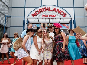 Canadian Derby goers take a selfie at Northlands Park on Saturday, Aug. 20, 2016.
