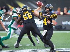 Hamilton Tiger-Cats quarterback Zach Collaros passes during the first half of CFL football action in Hamilton on Saturday, August 20, 2016. (THE CANADIAN PRESS/Peter Power)