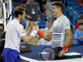 Andy Murray of Great Britain and  Milos Raonic of Canada shake hands after Murray won their semifinal match 6-3, 6-3 during day 8 of the Western & Southern Open at the Lindner Family Tennis Center  on August 20, 2016 in Mason, Ohio.  (Andy Lyons/Getty Images)