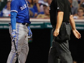 Ezequiel Carrera of the Toronto Blue Jays -- batting second in the revamped lineup -- exchanges words with plate umpire Greg Gibson after a called third strike in Toronto's game against the Cleveland Indians on Aug. 20, 2016 in Cleveland, Ohio. (DAVID MAXWELL/Getty Images)