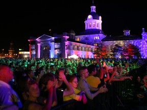 Thousands of The Tragically Hip fans pack Springer Market Square in Kingston for the live viewing of the Hip concert on a large screen on Aug. 20. (Elliot Ferguson/The Whig-Standard)
