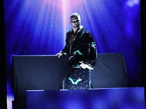 Peterborough's Bobby Roode is lowered to the entrance ramp during his NXT debut at NXT Takeover Brooklyn II on Saturday night in Brooklyn, N.Y. Roode won his debut. (George Tahinos/SLAM! Wrestling)