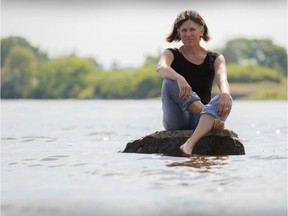 Ottawa Riverkeeper Meredith Brown, pauses for a portrait near the Remic Rapids in the Ottawa river June 20, 2016. Brown helps reconnect capital residents with the river. Ottawa Citizen photo by Jason Ransom JASON RANSOM / JASON RANSOM