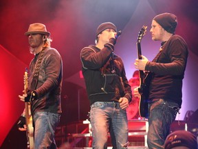 Todd Harrell, Brad Arnold and Matt Roberts performing in 2011. (Wikipedia commons)