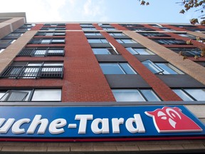 Signage of a Couche-Tard convenience store is shown in Montreal in an Oct. 5, 2012, file photo. Alimentation Couche-Tard Inc. has announced a US$4.4-billion friendly deal to buy Texas-based CST Brands Inc. (THE CANADIAN PRESS/Graham Hughes, File)