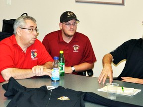 Kory Dietz (right), head coach and director of hockey operations with the Mitchell Hawks, announced five player signings last Thursday, Aug. 18 at the Mitchell Golf & Country Club. Also pictured is Hawks’ President Gus Eyers (left) and equipment manager Tim Horton. ANDY BADER MITCHELL ADVOCATE