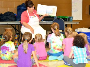 Kids from Mitchell and the surrounding area were able to participate in The Brand New Beat music and art day camp at the Mitchell and District Arena last week, Aug . 15-19. Pictured, camp instructor Tanya Ross reads The Pout Pout Fish to campers as part of the Under the Sea Theme day Aug. 16. GALEN SIMMONS MITCHELL ADVOCATE