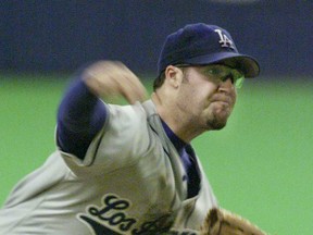 Eric Gagne pitches for the L.A. Dodgers in a game against the Montreal Expos in this 2001 file photo.  (John Kenney/Montreal Gazette)