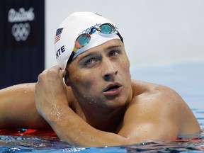 In this Tuesday, Aug. 9, 2016, file photo, United States' Ryan Lochte checks his time in a men's 4x200-metre freestyle heat during the swimming competitions at the 2016 Summer Olympics, in Rio de Janeiro, Brazil. Speedo announced Monday, Aug. 22, 2016, that they are dropping their sponsorship of Lochte. (AP Photo/Michael Sohn, File)